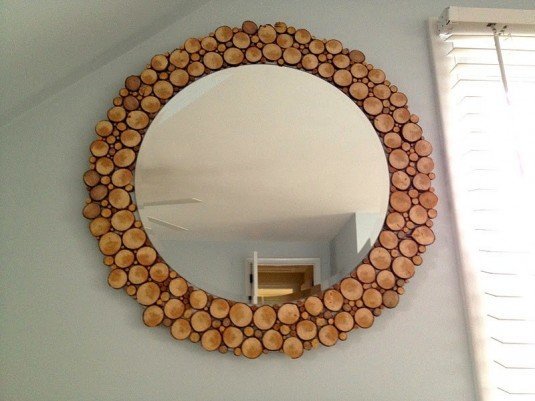 Mirrors are must-have pieces in bathrooms and bedrooms and a wooden one will make your space more interesting and warm